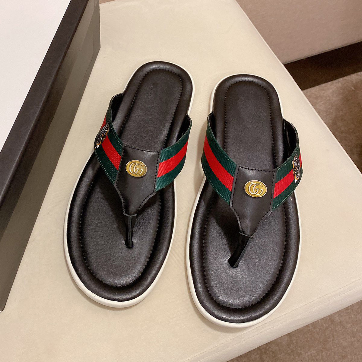 Leather brand flip flops